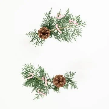 Christmas composition with tree branches on white background. Flat lay, top.. Stock Illustration