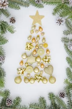 Christmas composition tree made of New year decorations,golden balls,heart Stock Photos