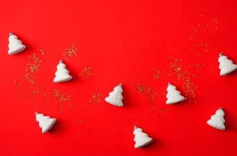 Christmas composition. White decorations on a red background. new year concept. Stock Photos