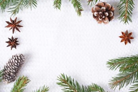 Christmas composition on white knitted background. Stock Photos