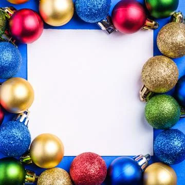 Christmas composition with white square copy space. Colorful ornaments Stock Photos