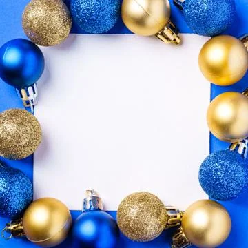 Christmas composition with white square copy space. Colorful ornaments Stock Photos