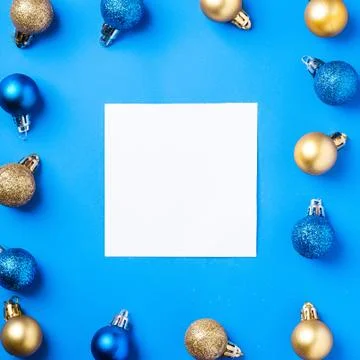 Christmas composition with white square copy space. Colorful ornaments Stock Photos