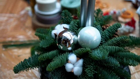 Christmas composition in wicker basket on light wooden surface table, close-up Video stock 89264472