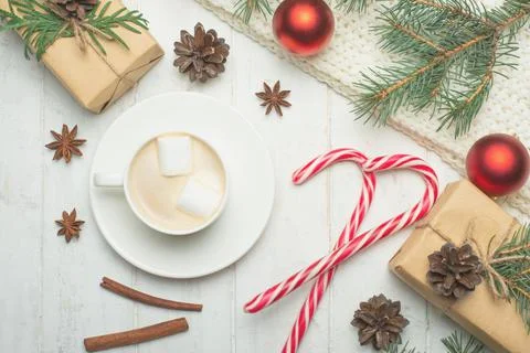 Christmas composition.Coffee with marshmallows, pine cones, spruce branches a Stock Photos