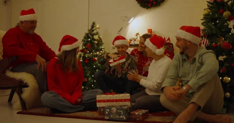 Christmas concept of 4k Resolution. Russian families are giving gifts to th.. Stock Footage 257569266