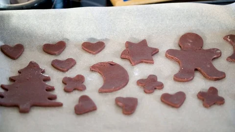 Christmas cookies on a baking sheet ready to be baked Stock Footage 121531432