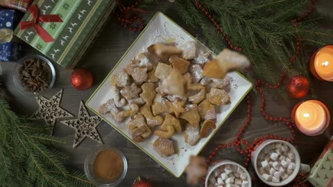 Christmas cookies fall on the table in slow mo. Stock Footage 164950710