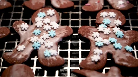 Christmas cookies in the shape of a man on a grid Stock Footage 121531402
