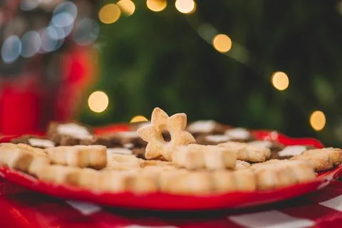 Christmas cookies in the shape of stars on a blurred background focus camera Stock Photos