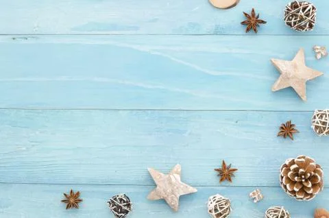Christmas corner frame with copy space for greeting card on rustic blue wooden Stock Photos