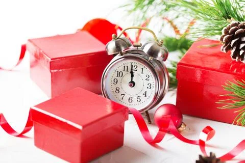 Christmas countdown to the new year. Clock and balls and fir spr Stock Photos