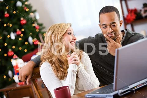 Christmas: couple discussing what they want for christmas Stock-Fotos