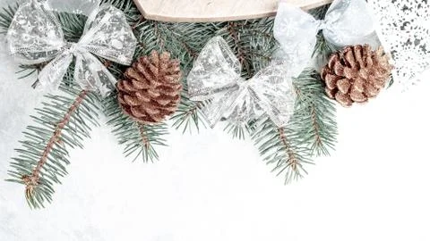 Christmas creative background border, gold color, cones, branches, place for  Stock Photos
