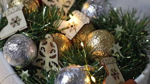 Christmas decor and candy balls in a basket. Stock Footage 220042850