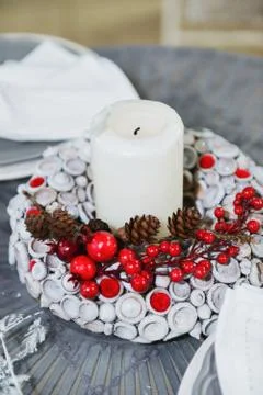 Christmas decor Festive table setting. New Year's floral arrangement Stock Photos