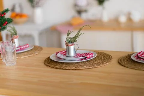 Christmas decor ,table setting green and red and yellow colors on the table in Stock Photos