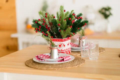 Christmas decor ,table setting green and red and yellow colors on the table in Stock Photos