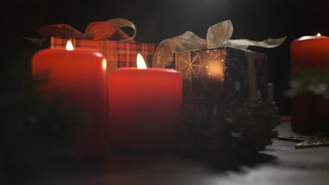 Christmas decoration with burning candles on dark background. Christmas holidays Stock Footage 166301736