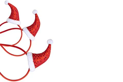 Christmas decoration in the form of a pattern with a red cap on a white backg Stock Photos