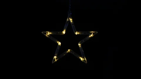 Christmas decoration star glowing in the dark background Stock Footage 112331153