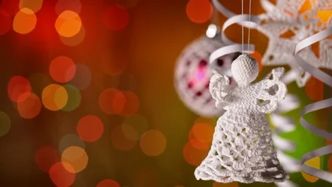 Christmas decorations against blurry blinking xmas lights Видео 81265722