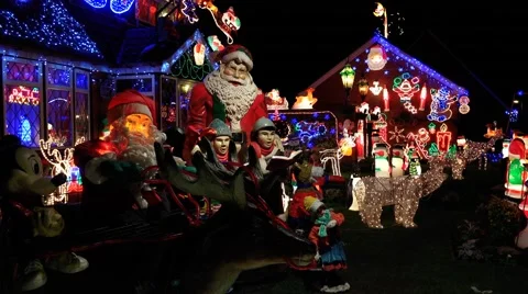 Christmas decorations and lights on house at night Stock Footage