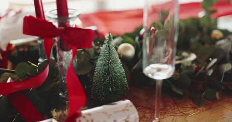 Christmas, decorations and table setting in dining room for festive celebration Stockbeeldmateriaal 312869351