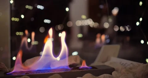 Christmas decorations with biofire create magical holiday atmosphere. warmth of Stock Footage 300790376