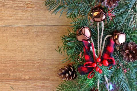 Christmas decorations - branches of coniferous trees with decorations on a wo Stock Photos