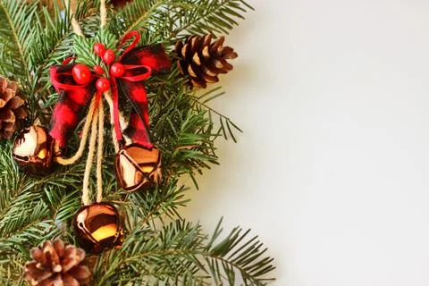 Christmas decorations - branches of coniferous trees with decorations on a wo Stock Photos