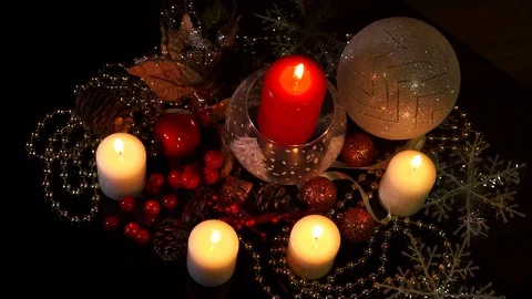 Christmas decorations with candles on dark background Candles Burning Stock Footage 120901503