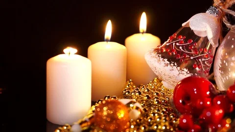 Christmas decorations with candles on dark background Candles Burning Stock Footage 120901533