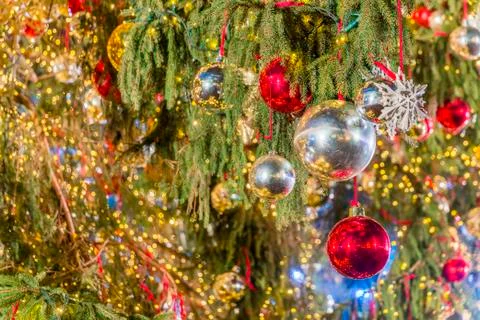 Christmas decorations on Christmas tree, balls, boxes Stock Photos