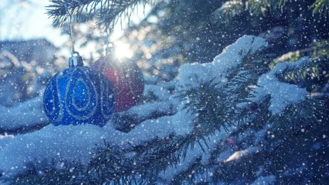 Christmas decorations on the Christmas tree, falling snow, holiday decor Stock Footage 121845770