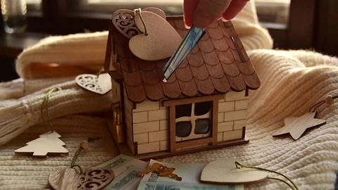Christmas decorations. Concept of saving on the house in the new year. Stock Footage 219878630