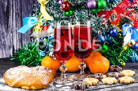 Christmas decorations on a dark wooden background, pastries, biscuits, tanger Stock Photos