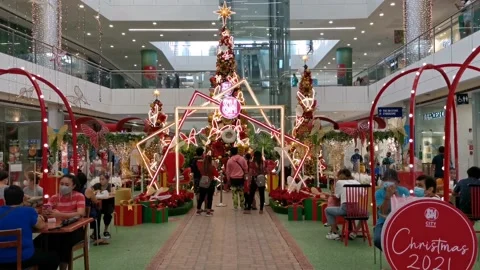 Christmas Decorations in a Dining Area Inside a Mall Stock Footage 166693621