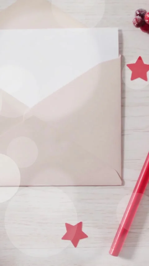 Christmas decorations with envelope and candy cane heart over red stars Stock Footage 342813015