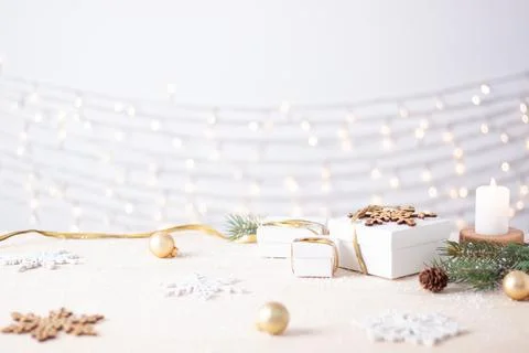 Christmas decorations with gifts on white background. Close up, copy space Stock Photos