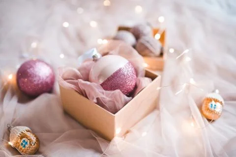 Christmas decorations in open present box closeup. Winter holidays. Stock Photos