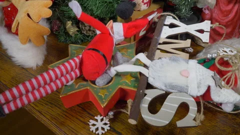 Christmas decorations piled up on a table. Stock Footage 146133327