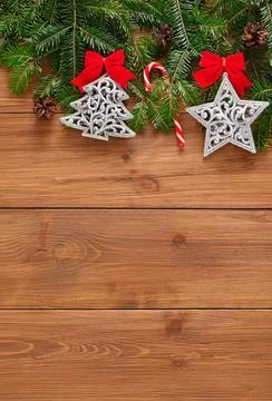 Christmas decorations with pine branches and ornaments on wood Stock Photos