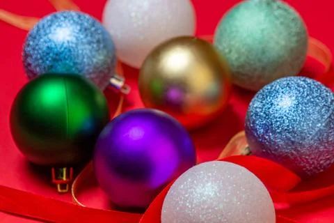 Christmas decorations on a red background. Stock Photos