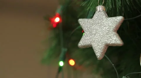 Christmas decorations in the shape of a star. Decorated Christmas tree. Stock Footage 66364247