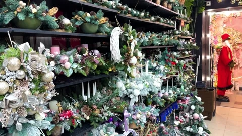 Christmas decorations on the shelves in the store. Christmas and New Year Stock Footage 255471153