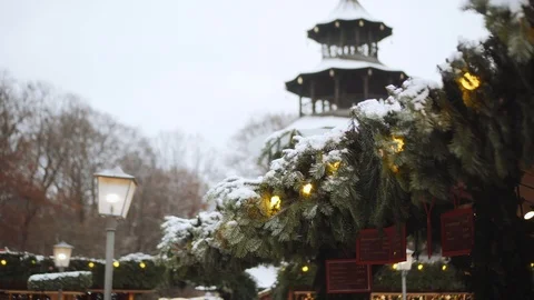 Christmas decorations with snowy spruce branches outside. Stock Footage 121119341