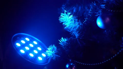 Christmas decorations on the tree. Christmas tree isolated on black background Stock-Footage 147935103