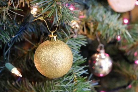 Christmas decorations on a tree Stock Photos