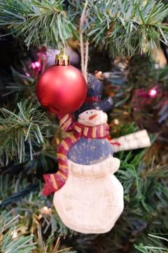 Christmas decorations on a tree Stock Photos